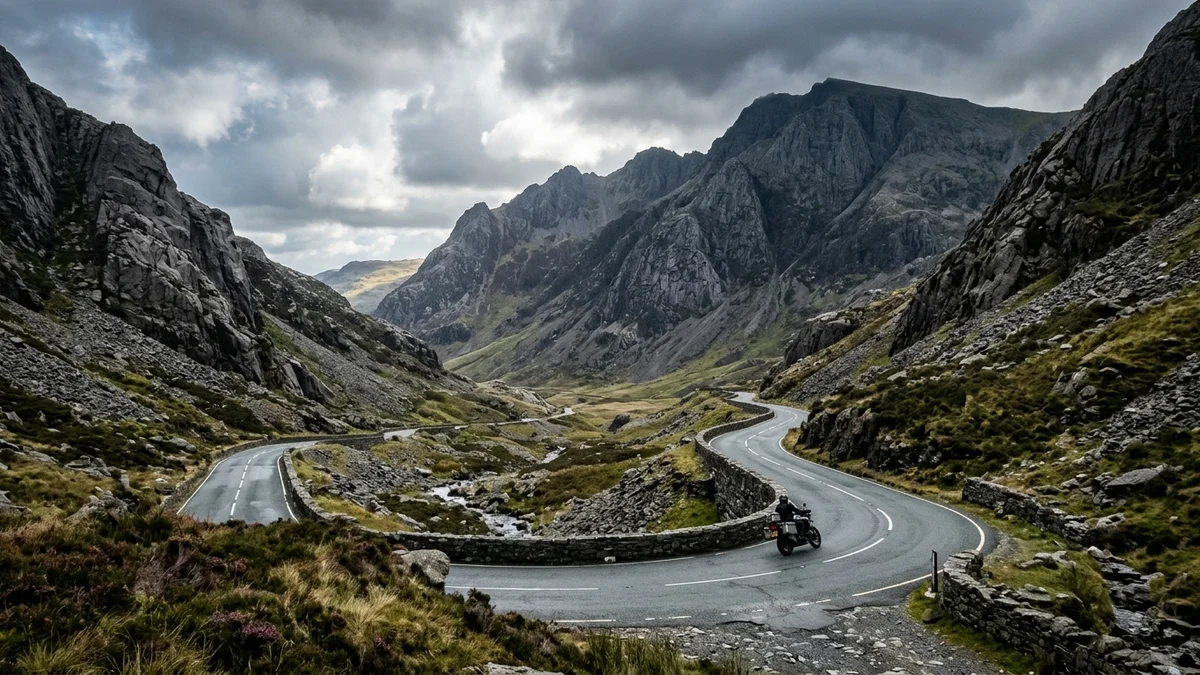 Llanberis Pass A4086 road winding through the rugged crags of Eryri Snowdonia National Park in North Wales